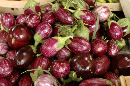 Aubergines on a market stall